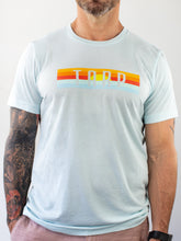 Load image into Gallery viewer, Sunset Tarp Unisex Tee - Light Blue