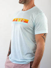 Load image into Gallery viewer, Sunset Tarp Unisex Tee - Light Blue